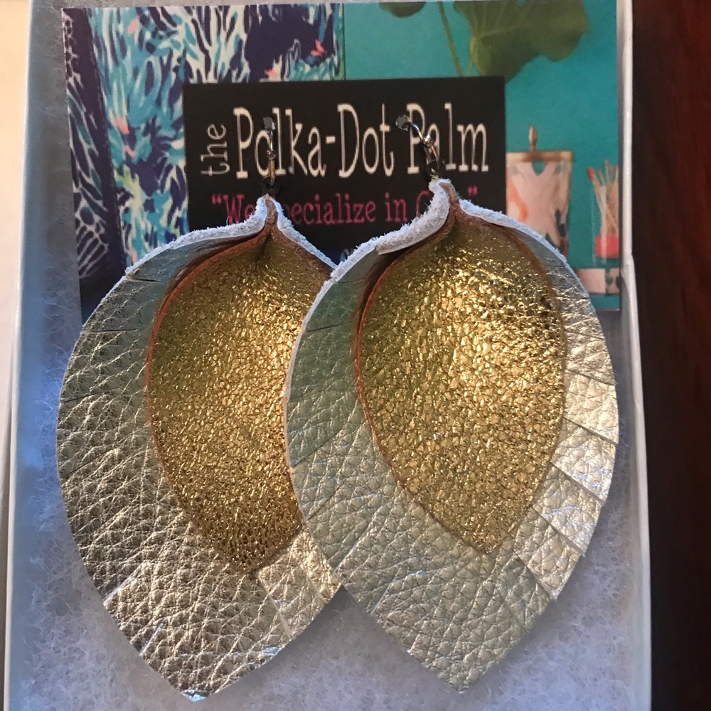 “Leather” earrings. Gold and silver.